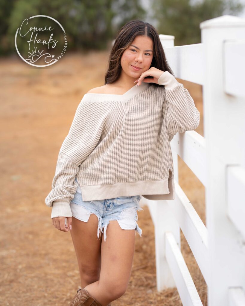 Family photos at Penasquitos Canyon, San Diego, California. Family with teens in wooded tree area, pepper trees, cactus garden, white fencing and rustic vibes.