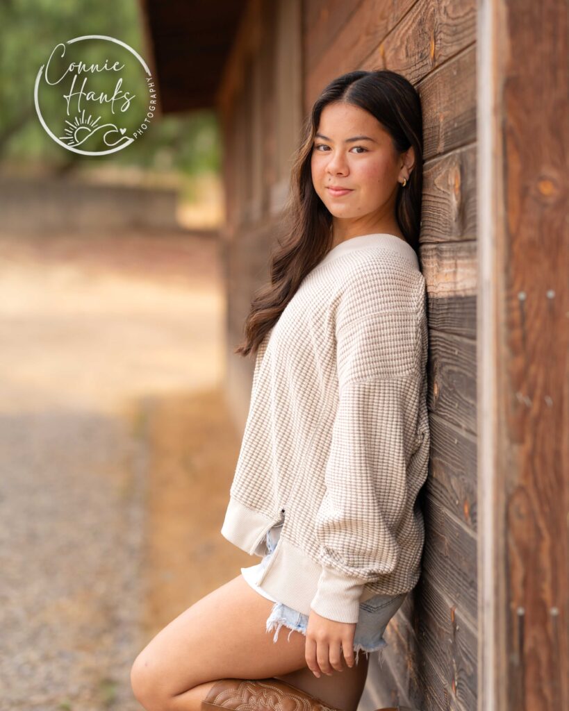 Family photos at Penasquitos Canyon, San Diego, California. Family with teens in wooded tree area, pepper trees, cactus garden, white fencing and rustic vibes.