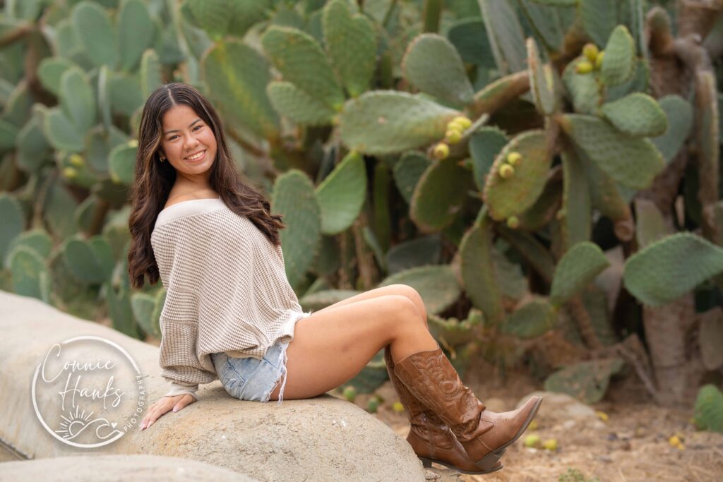 Family photos at Penasquitos Canyon, San Diego, California. Family with teens in wooded tree area, pepper trees, cactus garden, white fencing and rustic vibes.