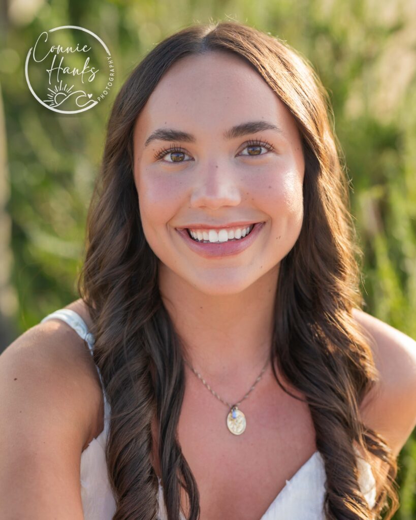 Senior photos wildflower field in Chula Vista, San Diego, California. Gorgeous girl in mustard seed wildflowers.