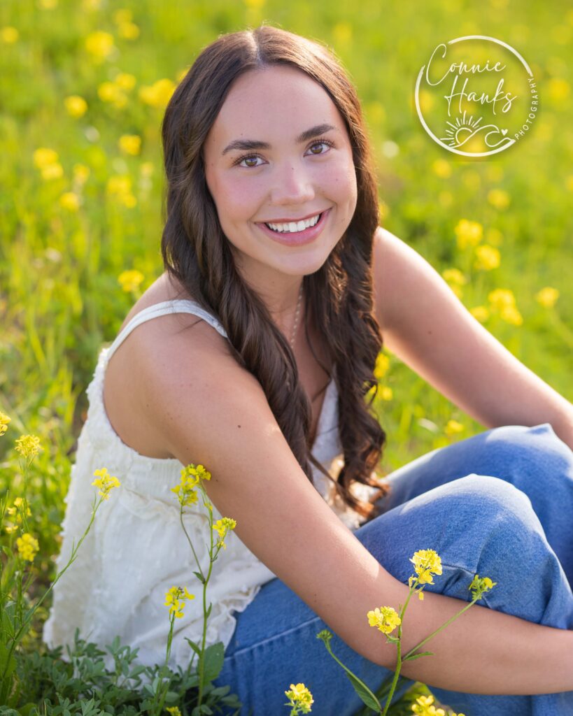 Senior photos wildflower field in Chula Vista, San Diego, California. Gorgeous girl in mustard seed wildflowers.