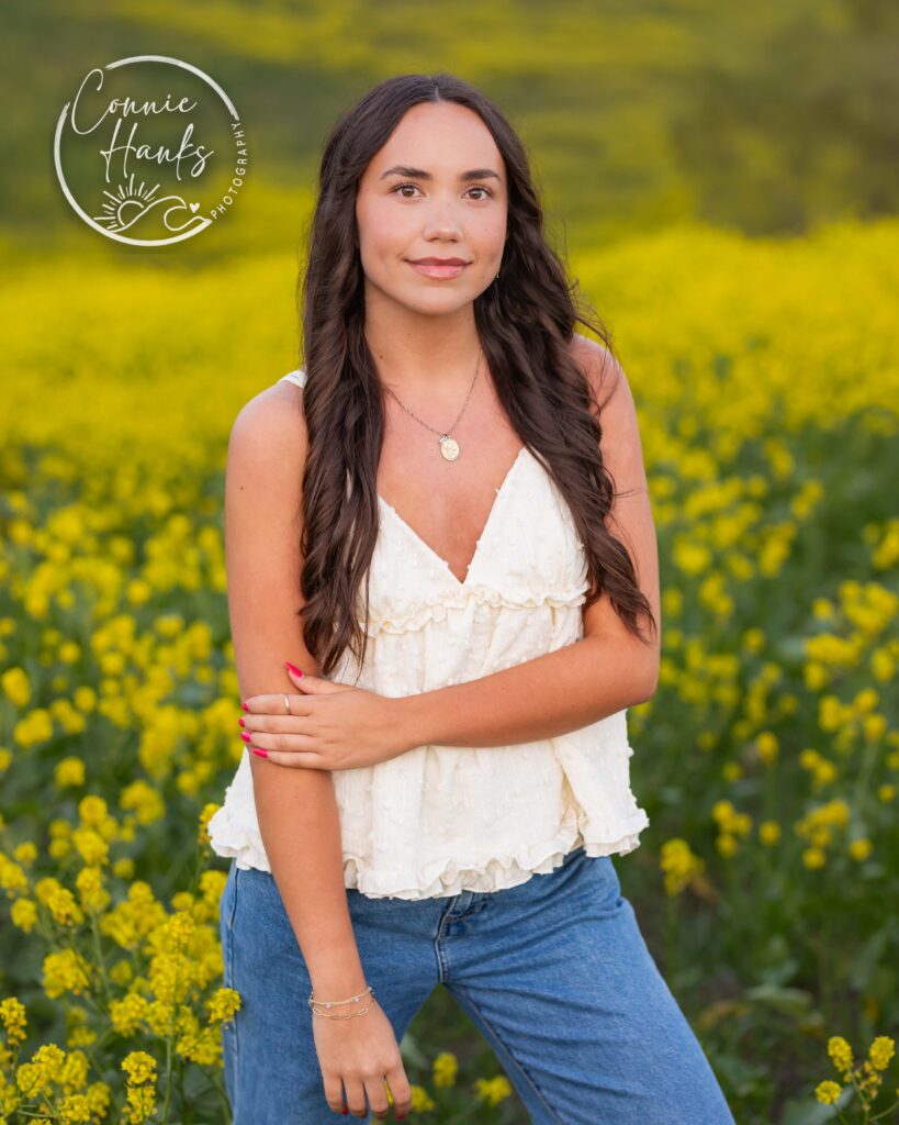 Senior photos wildflower field in Chula Vista, San Diego, California. Gorgeous girl in mustard seed wildflowers.