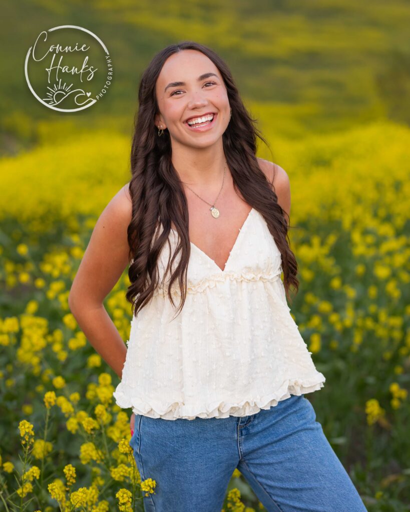 Senior photos wildflower field in Chula Vista, San Diego, California. Gorgeous girl in mustard seed wildflowers.